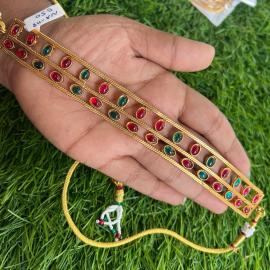 Double line within oval shape design with stone neckpiece