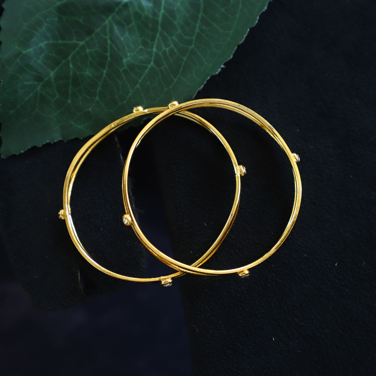 'SRING' BANGLES