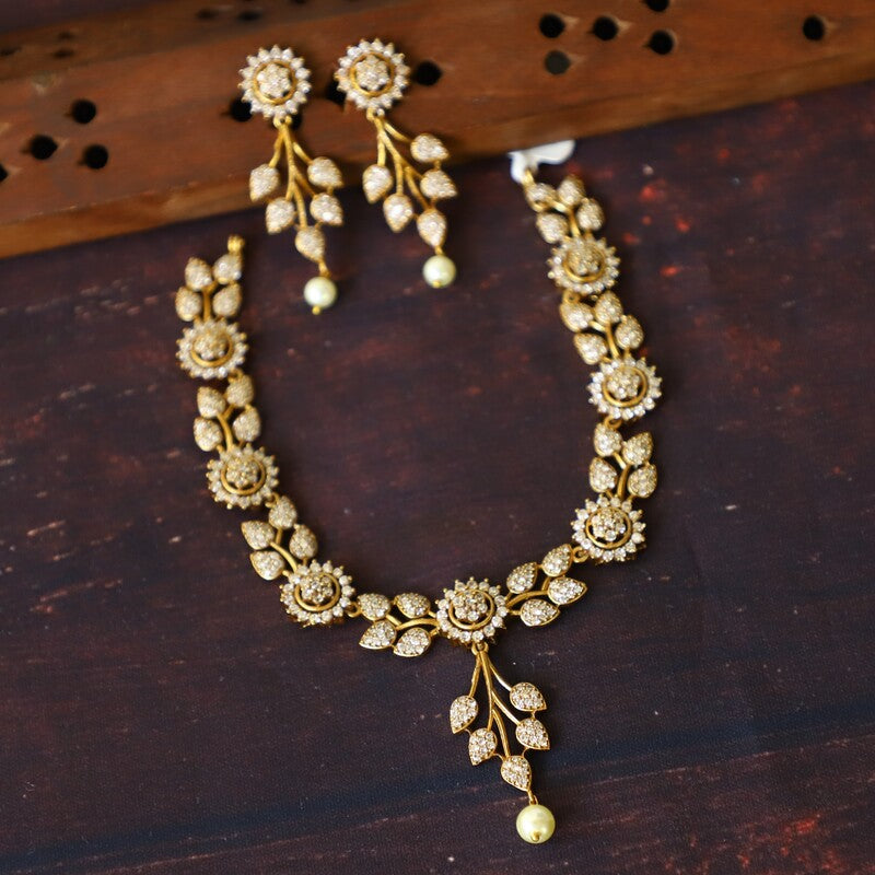 FLORAL AD NECKPIECE