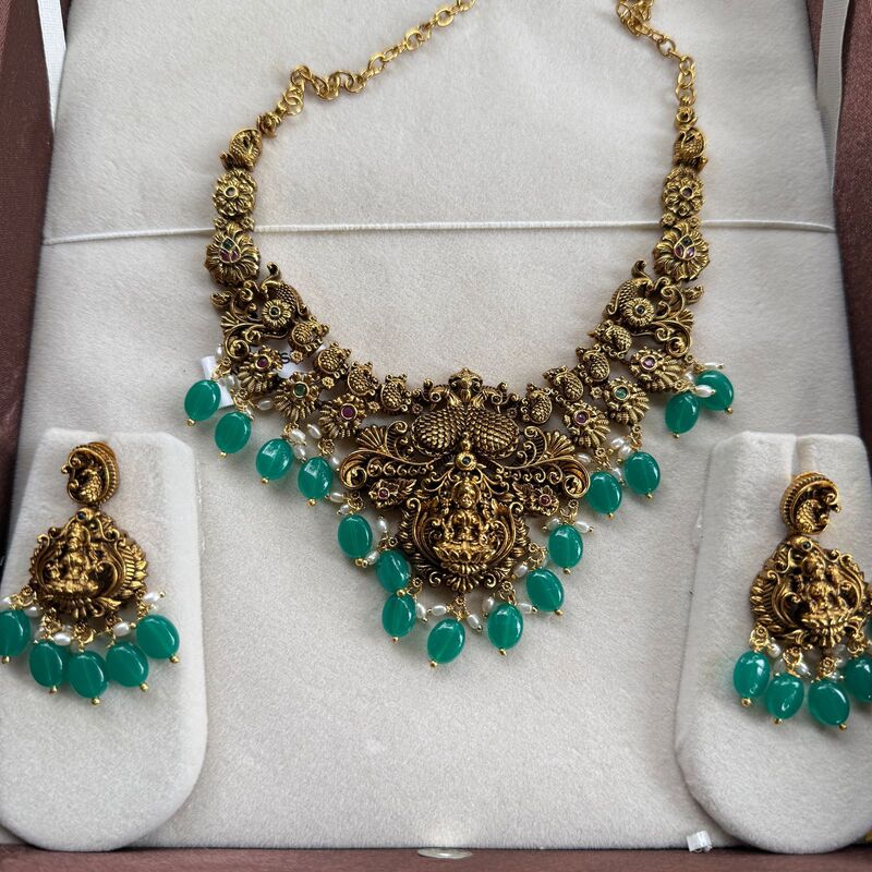 antic peacock design neckpiece