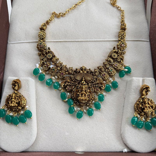 antic peacock design neckpiece