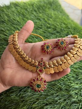 coin with peacock design neck piece