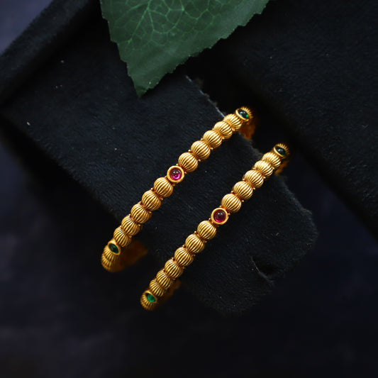 NELLIKA BANGLE