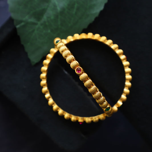 NELLIKA BANGLE