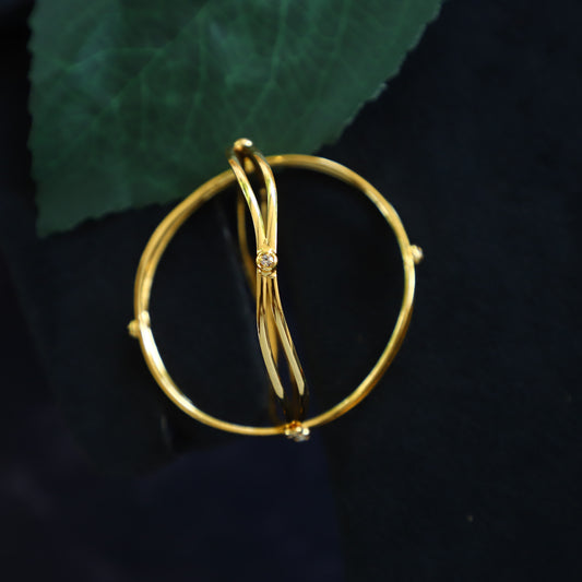 'SRING' BANGLES